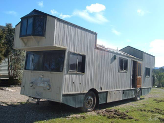 Illustration for article titled Crazy Wooden Homes on Wheels Are Ripped Out of Victorian Dreams